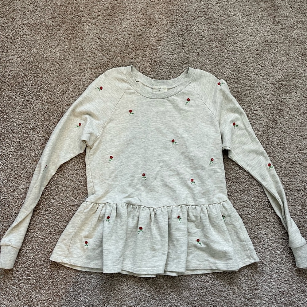 Rose peplum top